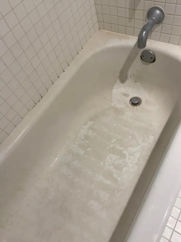 A freshly cleaned white bathtub
